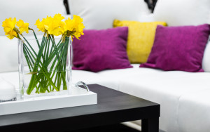 Sofa with fresh flowers - cropped